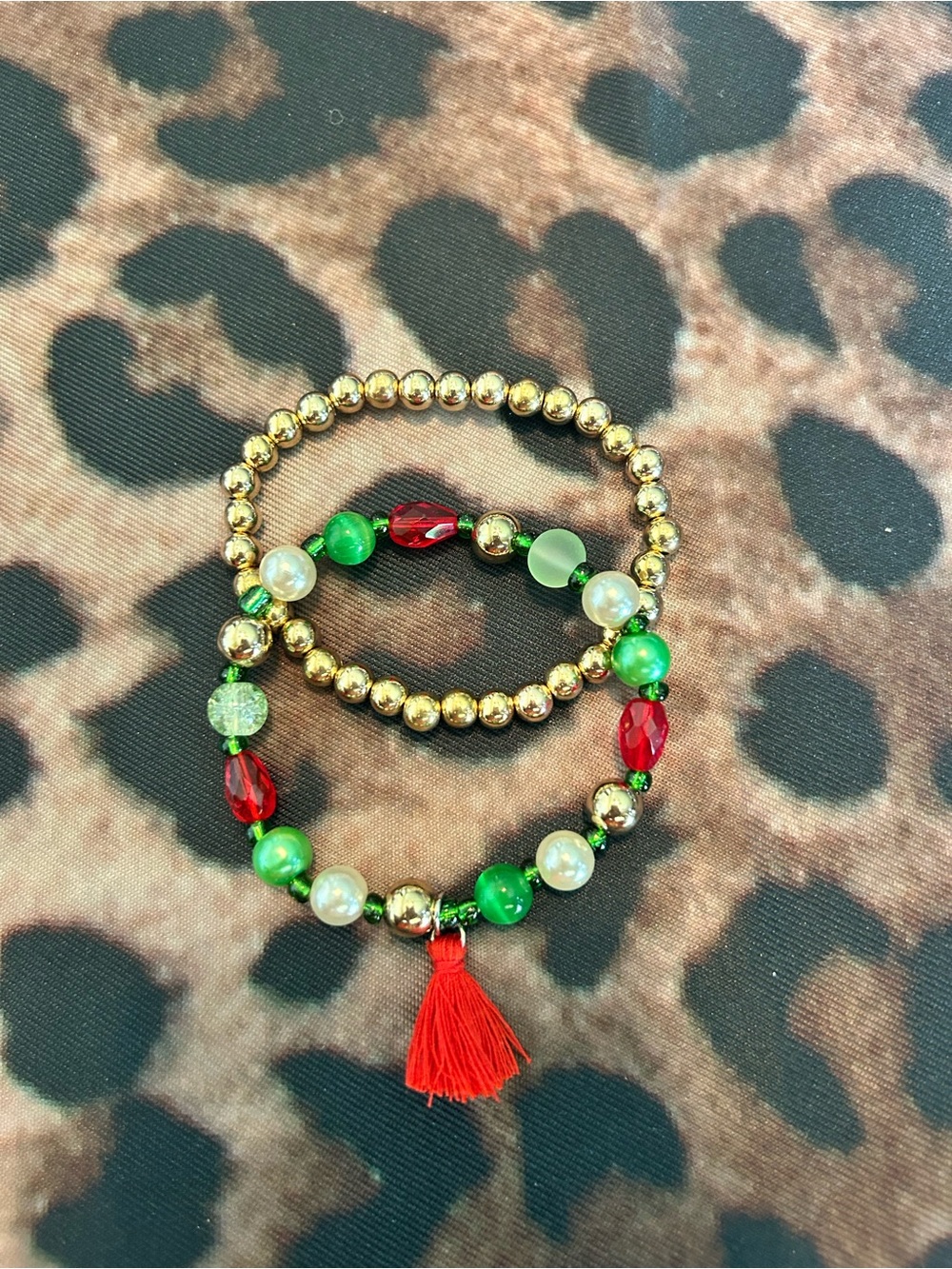 Gold and Green Beaded Bracelet Set with Red Tassel